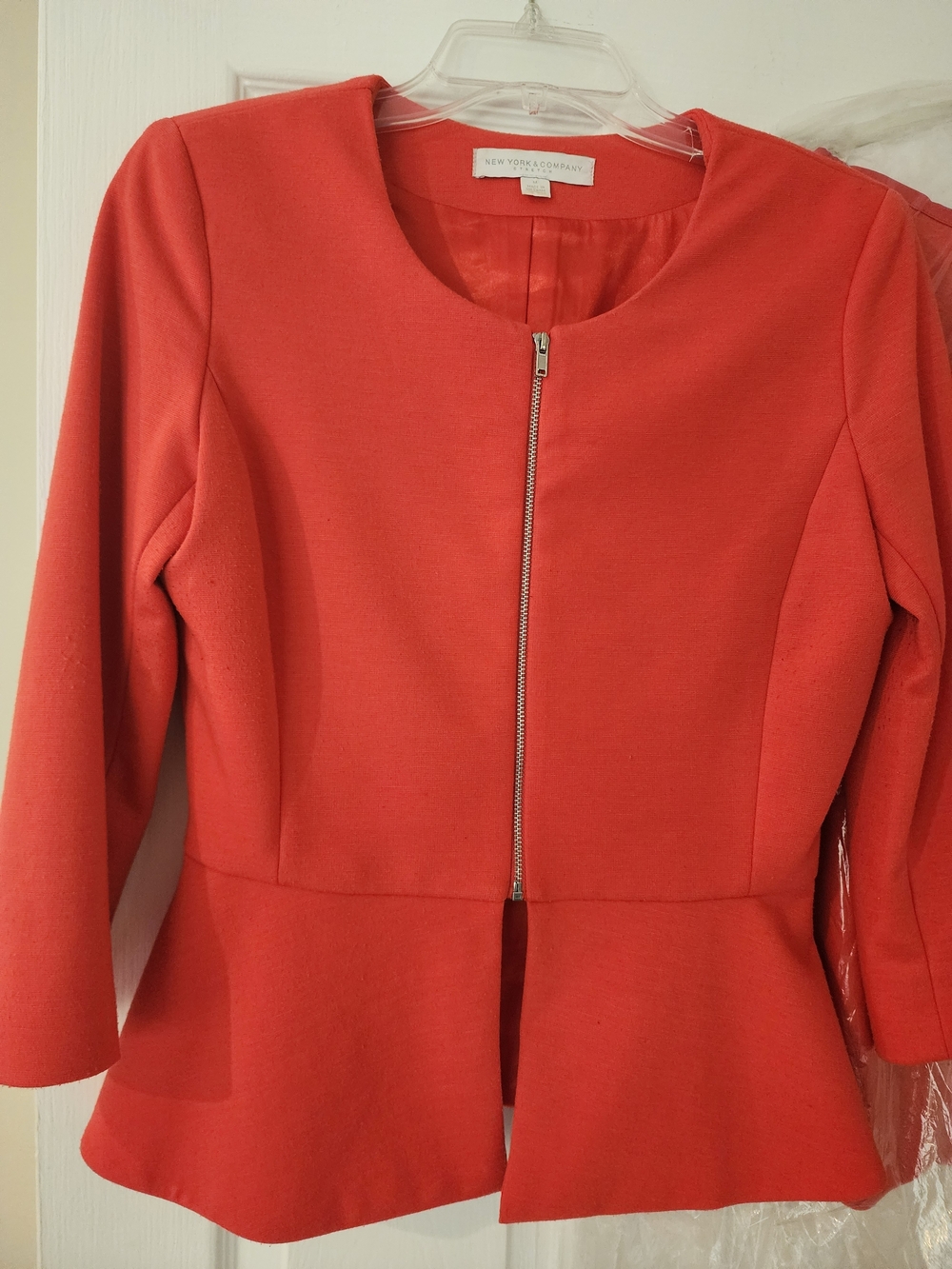 2 Piece Suit.  Coral Peplum Suit Jacket And Skirt